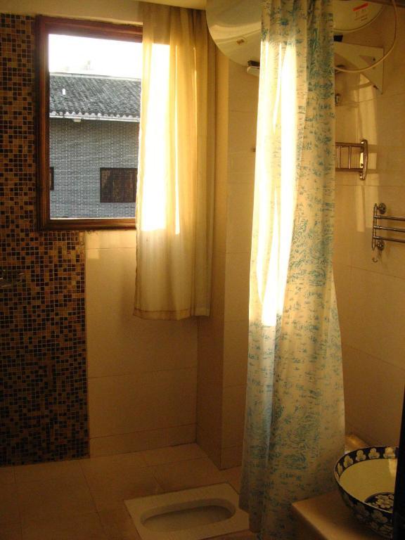 Bajie Youth Hostel Čang-ťia-ťie Pokoj fotografie